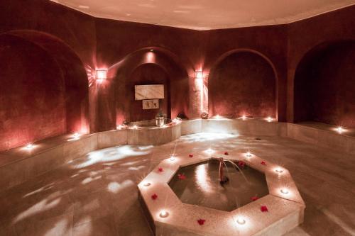 a room with a hot tub with lights in it at The Residence Tunis in Gammarth