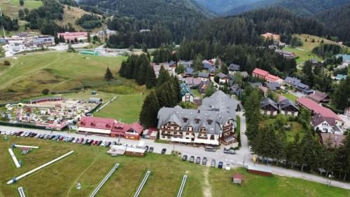 an aerial view of a town in the mountains at Kamzik Apartment hill view with garage in Donovaly