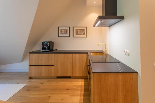 a kitchen with a sink and a counter top at Vallikraavi Studio Apartment in Tartu