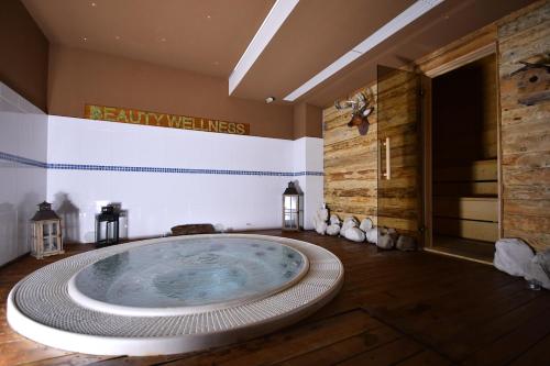 Koupelna v ubytování Hotel Il Cervo, SPA & Wellness, Bike Hotel