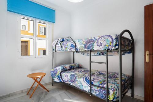 Postel nebo postele na pokoji v ubytování Apartamento Romo