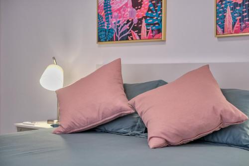 En eller flere senge i et værelse på Sugarsand Senator