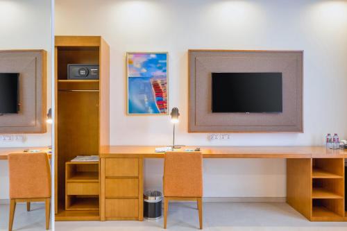 Alisa Hotel Temaにあるテレビまたはエンターテインメントセンター