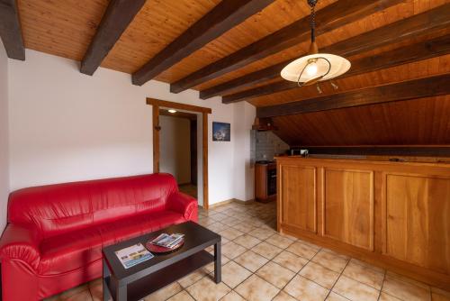 Posezení v ubytování Appartement de la Joux