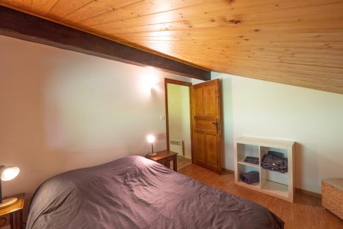 Postel nebo postele na pokoji v ubytování Appartement de la Joux