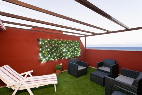 Χώρος καθιστικού στο Home2Book Sea Front Duplex Terrace Pool
