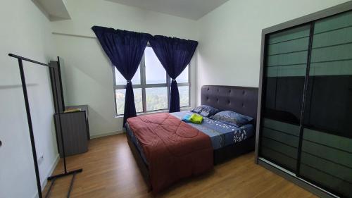 a bedroom with a bed and a large window at New Modern Condo with Pool at Bangi in Kampong Tangkas
