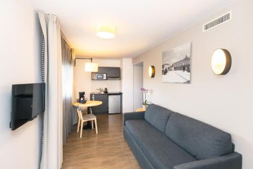 Kuchyň nebo kuchyňský kout v ubytování Aparthotel Adagio Access Nancy Centre