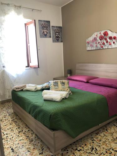 Ліжко або ліжка в номері Villetta Vacanza dalla nonna