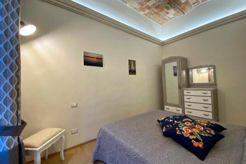 Ένα ή περισσότερα κρεβάτια σε δωμάτιο στο Palazzo Nobili