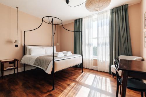 Postel nebo postele na pokoji v ubytování Redland Suites - Apartment 5