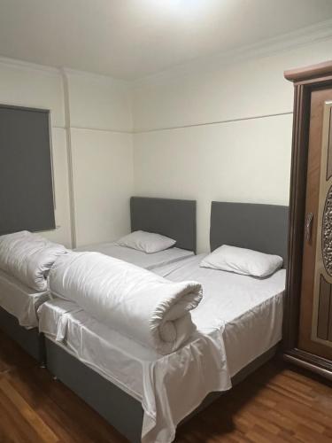 Postel nebo postele na pokoji v ubytování Jeeda Residence