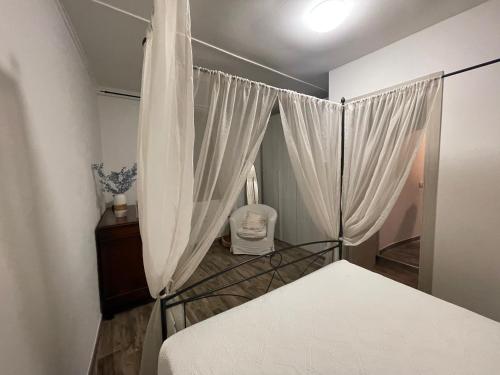 Giường trong phòng chung tại La corte brianzola-
