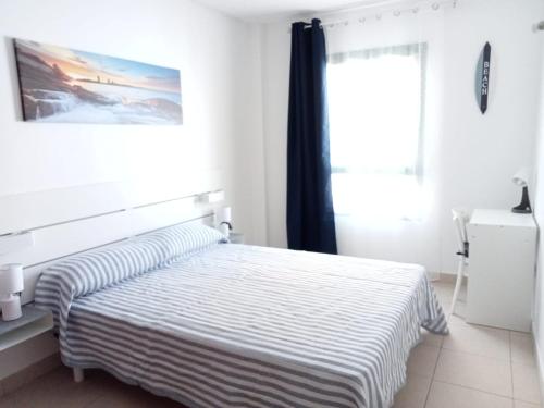 Postel nebo postele na pokoji v ubytování Casa Elsa appartamento incantevole Corralejo