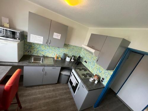 Kuchyň nebo kuchyňský kout v ubytování Ben's HOME