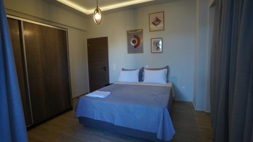 Posteľ alebo postele v izbe v ubytovaní Ventiri Family Suite 1
