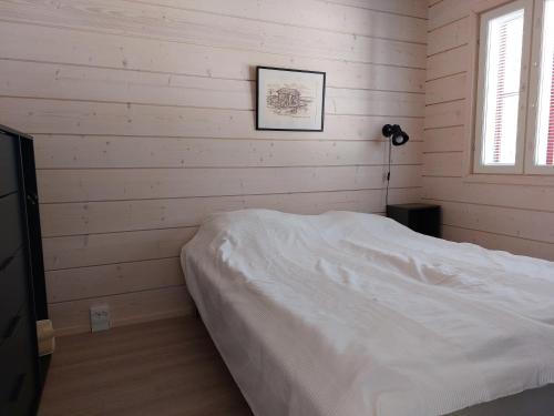 Кровать или кровати в номере Villa Ruskamaja