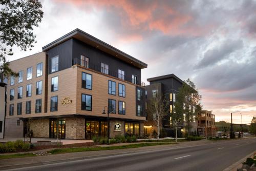 a rendering of a building on a city street at Hotel Indigo - Silverthorne by IHG in Silverthorne