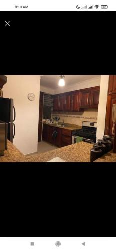 Η κουζίνα ή μικρή κουζίνα στο Beautiful Penthouse in La Vega, RD