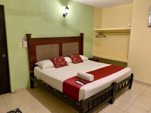 Postel nebo postele na pokoji v ubytování Casa Vidal Hotel
