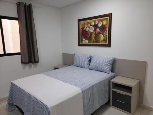 Katil atau katil-katil dalam bilik di Flats Tavares Araujo