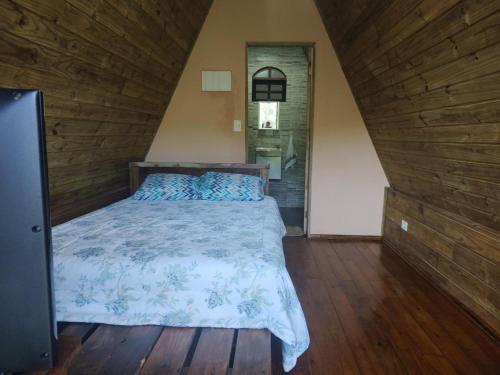 Katil atau katil-katil dalam bilik di Jângala Glamping Natureza