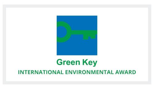 an image of the green key international environmental award logo at Hotel Boutique & Spa - VDL Colonial in Villa de Leyva