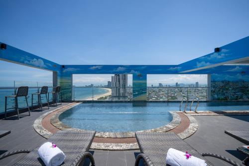a swimming pool on the top of a building at Nguyen Gia Hotel in Da Nang