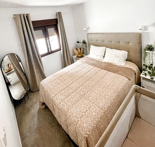 Postel nebo postele na pokoji v ubytování Rosa Amarilla Apartment
