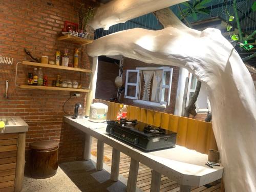 A kitchen or kitchenette at Da Lat in Phu Quoc - Venuestay