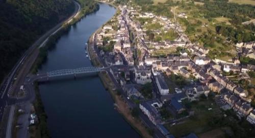an aerial view of a city next to a river at Le Clos Joli in Haybes