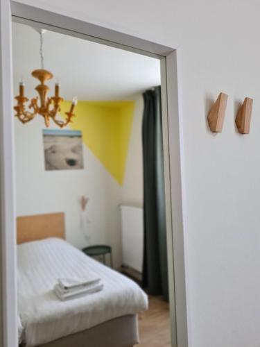 Ein Bett oder Betten in einem Zimmer der Unterkunft Sonnevanck Wijk aan Zee