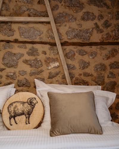 Ένα ή περισσότερα κρεβάτια σε δωμάτιο στο Afanos Guesthouse 