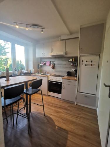 Η κουζίνα ή μικρή κουζίνα στο Gemütliche Gästewohnung in ruhiger Lage