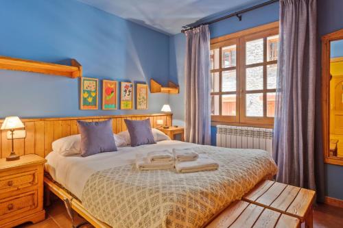 Krevet ili kreveti u jedinici u objektu Luderna - Apartamento D2 Suriguera de Canillo