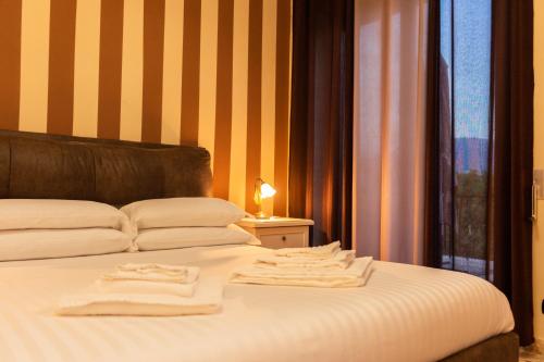 Posteľ alebo postele v izbe v ubytovaní B&B L'EDEN
