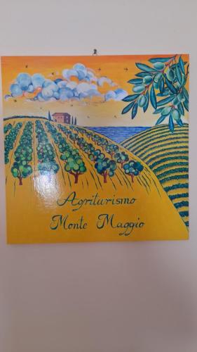 a sign with a picture of a vineyard at Agriturismo MonteMaggio in Lapedona