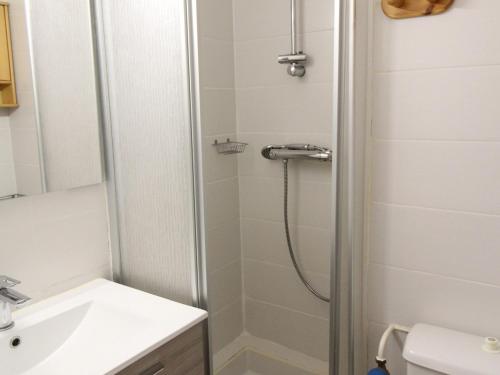 a bathroom with a shower and a sink at Appartement Lanslevillard, 2 pièces, 4 personnes - FR-1-508-231 in Lanslebourg-Mont-Cenis