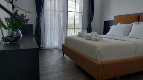 Postel nebo postele na pokoji v ubytování Bujtina Xhabakja