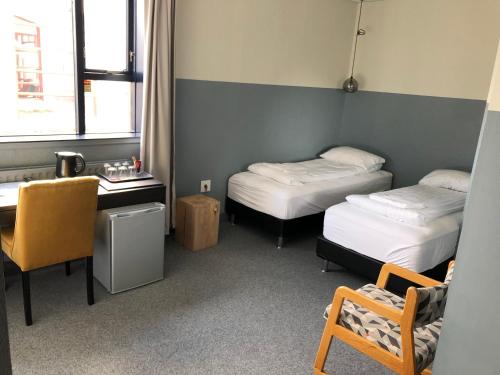 Postel nebo postele na pokoji v ubytování ABC Hotel by Reykjavik Keflavik Airport