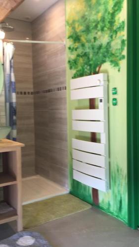 a bathroom with a shower stall with a shower at Fleurey la Cabotaine in Mont-Saint-Jean