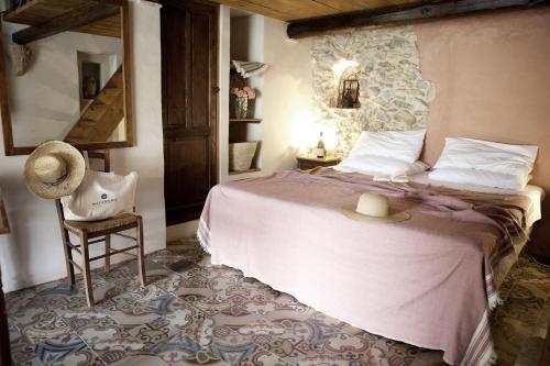 En eller flere senger på et rom på Villa Salinara
