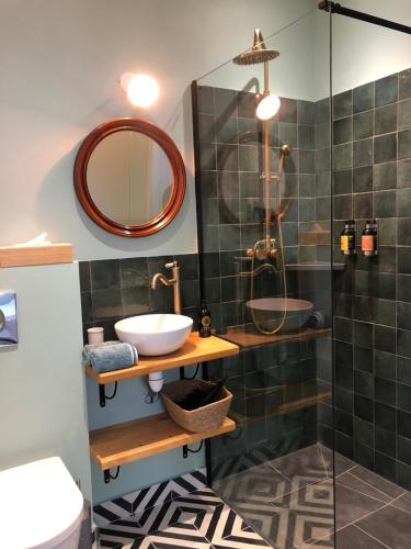 Un baño de Maison Tassigny