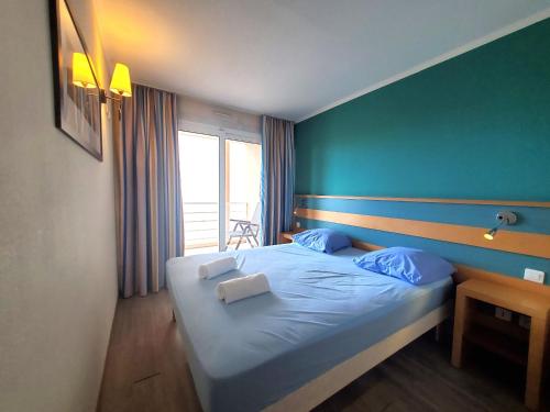 Posteľ alebo postele v izbe v ubytovaní CAP HERMES Vue MER Magnifique logement 6 couchages