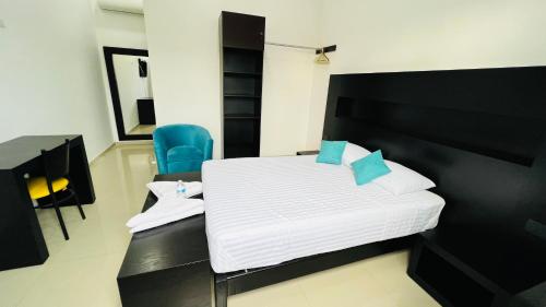 Ένα ή περισσότερα κρεβάτια σε δωμάτιο στο Hotel Villa Pralaya