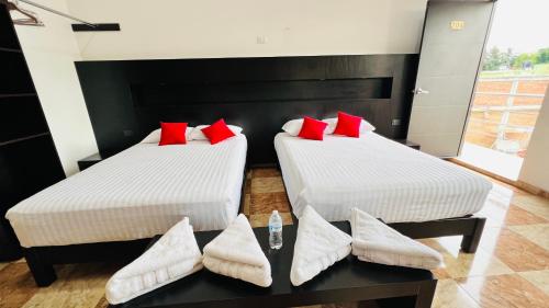 Hotel Villa Pralayaにあるベッド