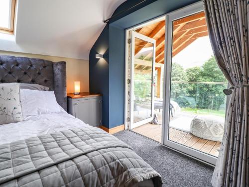 Voodi või voodid majutusasutuse Tyn Y Ceubren Bach at Evelyns Retreat toas