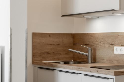 Kuchyň nebo kuchyňský kout v ubytování LIGHTHOUSE APPARTEMENTS