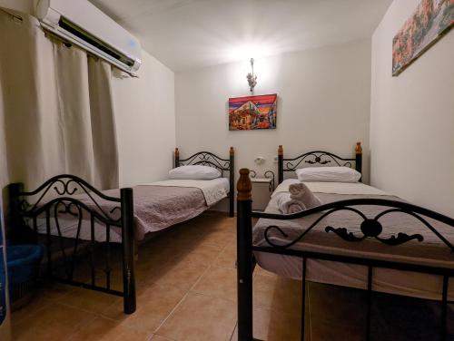a bedroom with two beds in a room at New Citadel Hostel in Jerusalem