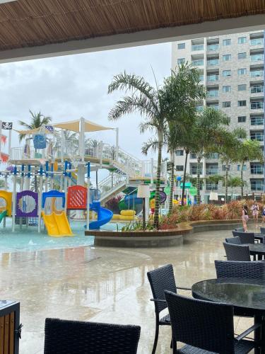 a water park with a slide and a water park at Salinas Exclusive Resort in Salinópolis